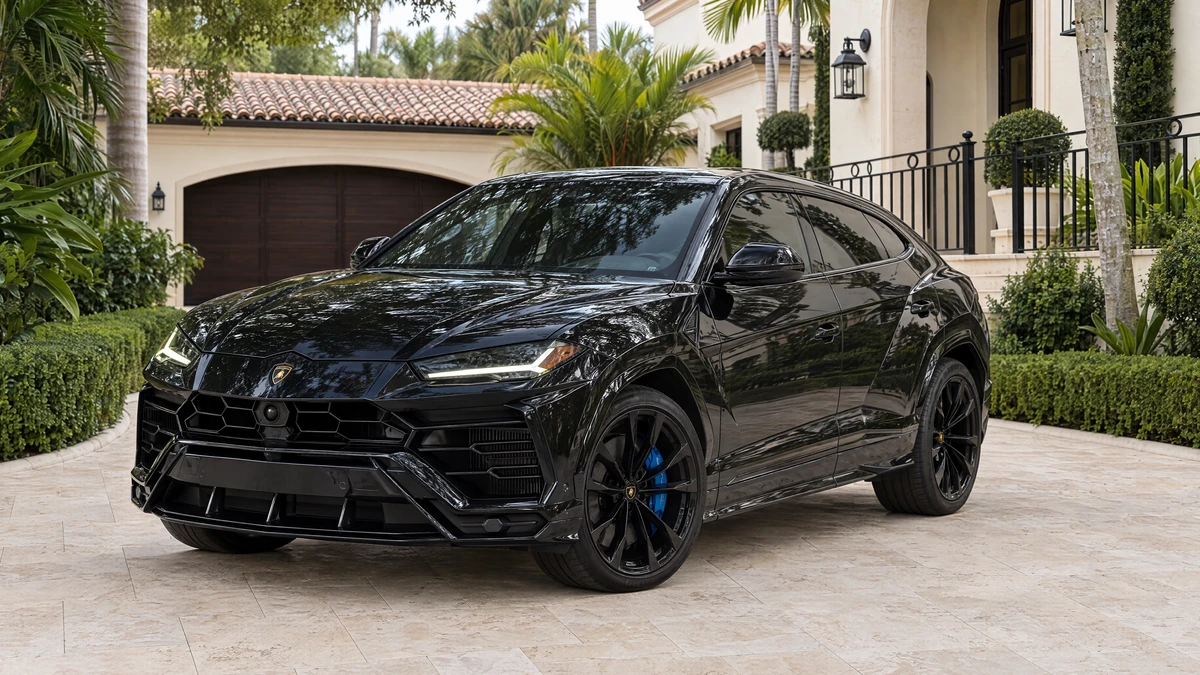 Black 2021 Lamborghini Urus Pearl Capsule with blue brake calipers in BEY's Miami rental gallery