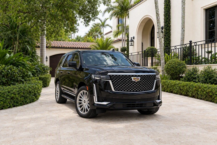 Black Cadillac Escalade with a three-row SUV body