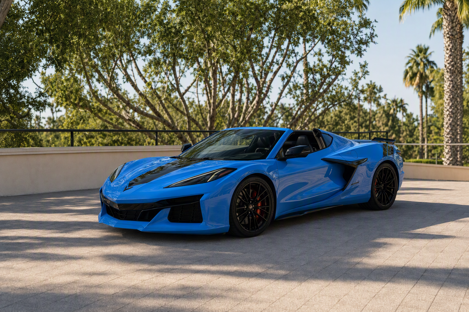 Blue 2024 Chevrolet Corvette Z06 3LZ convertible, front three-quarter view