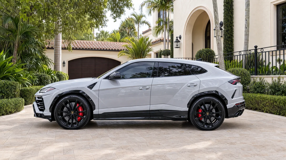 Rent a 2021 light-grey Lamborghini Urus in Miami