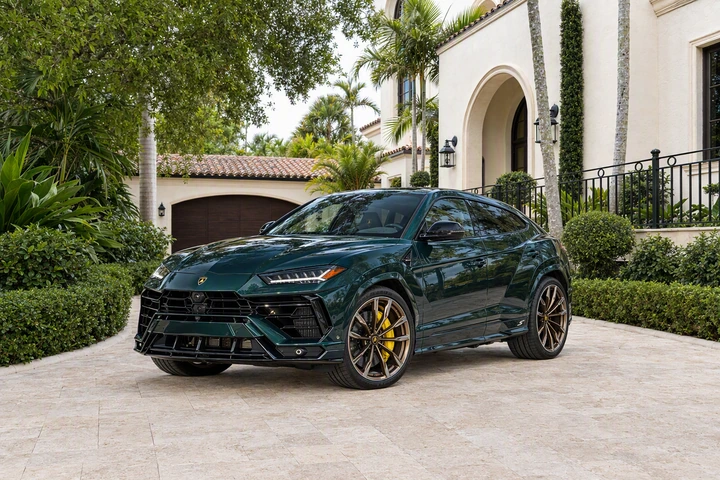 Dark green Lamborghini Urus S with bronze wheels and yellow brake calipers